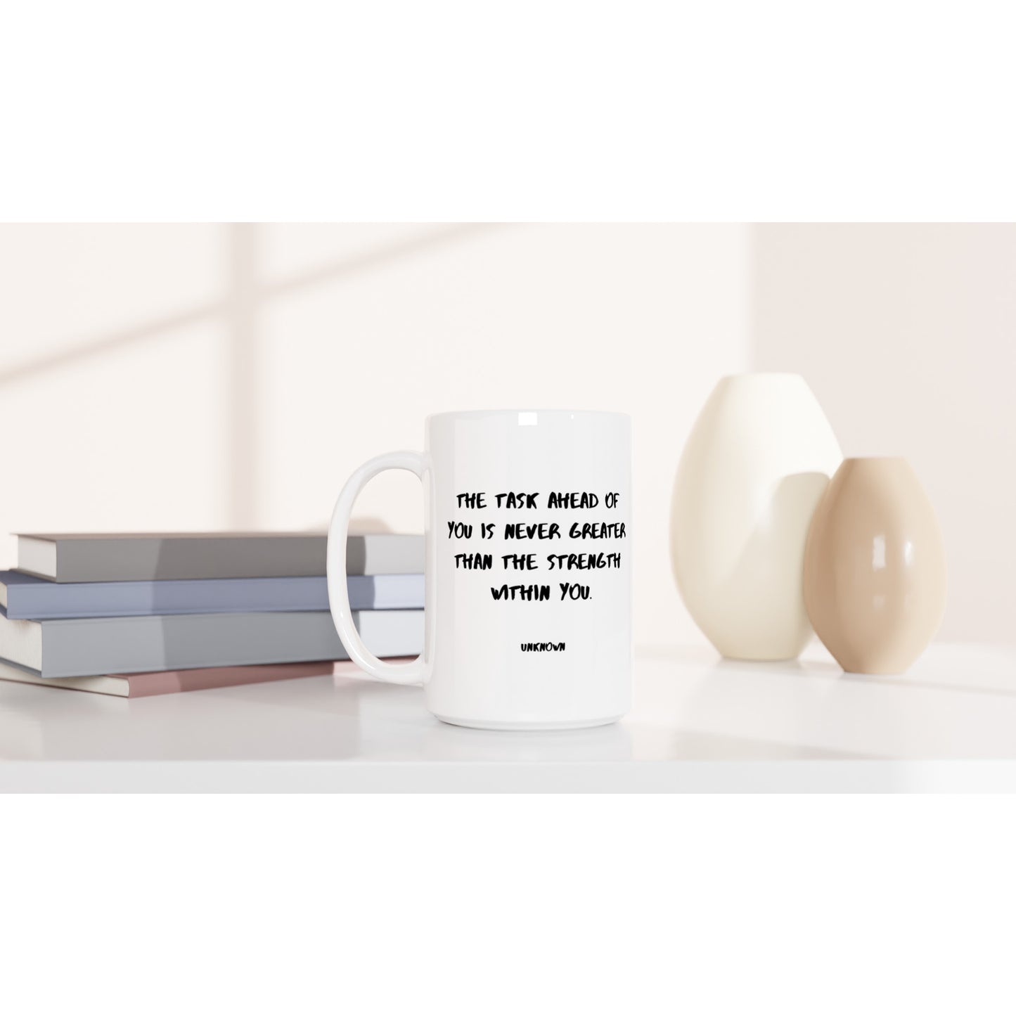 The task ahead of you is never greater than the strength within you. - Protagonist 15oz Ceramic Mug